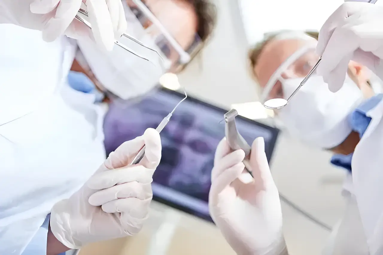 Dental team performing a procedure.