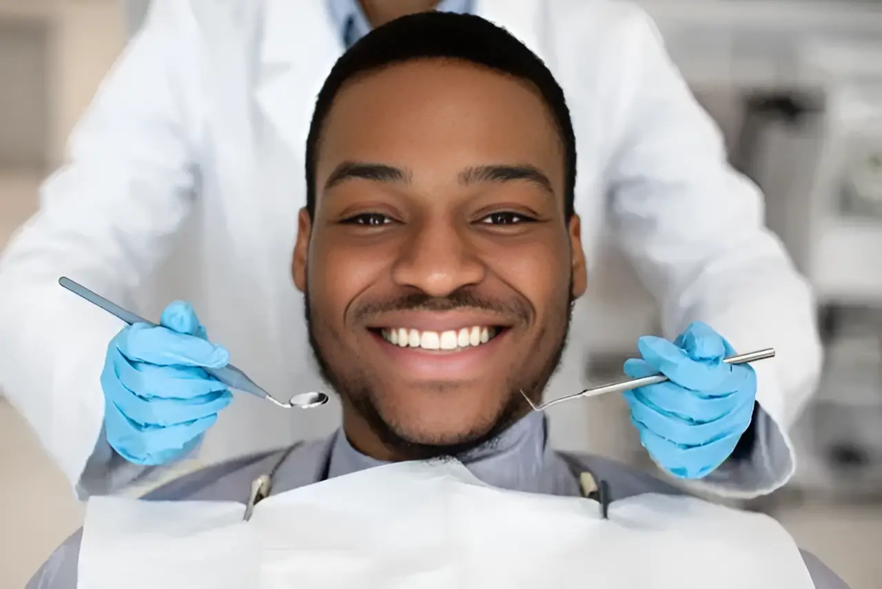 Smiling man at the dentist's office.