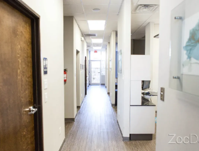 Clean, bright dental office hallway.